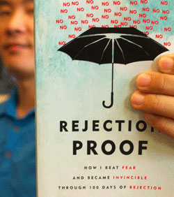 Jia Jiang holding his Rejection book
